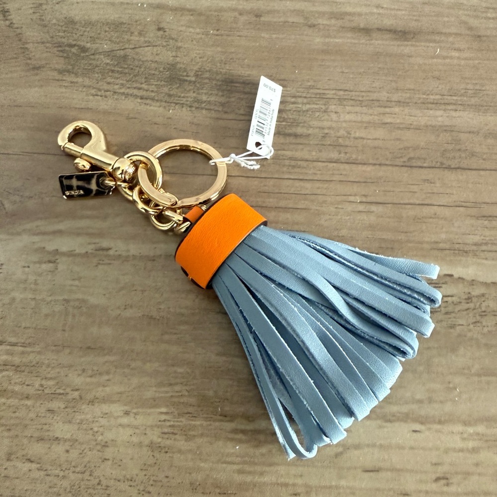 NWT Coach leather tassel bag charm keychain Blue/Gold without a dust bag